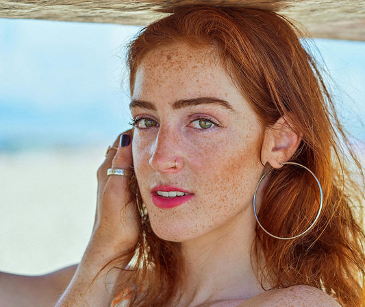 Why red hair fades fast in summer – and what you can do about it